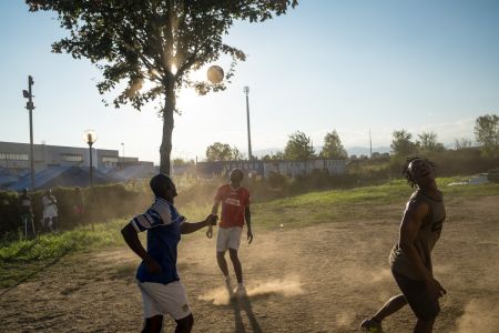 Guests play soccer at the Red Cross camp in Settimo Torinese (Italy).
